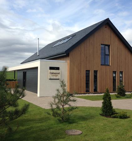 A photograph showing the exterior design of one of the lodges at Lochside.