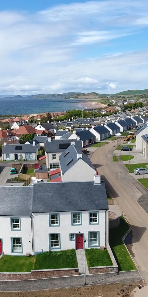 An aerial shot showing the Chapelton development and the sea view beyond.